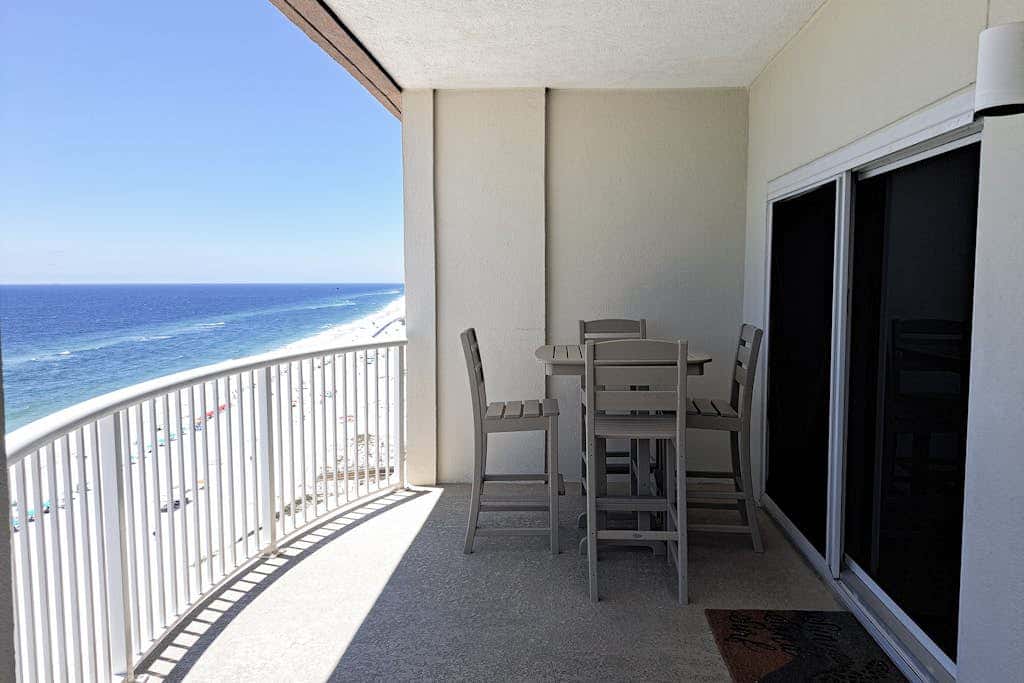 Beach-front condo with pool, hot tub, sauna, washer,dryer & grill