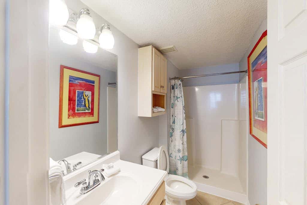 Beach-front condo with pool, hot tub, sauna, washer,dryer & grill