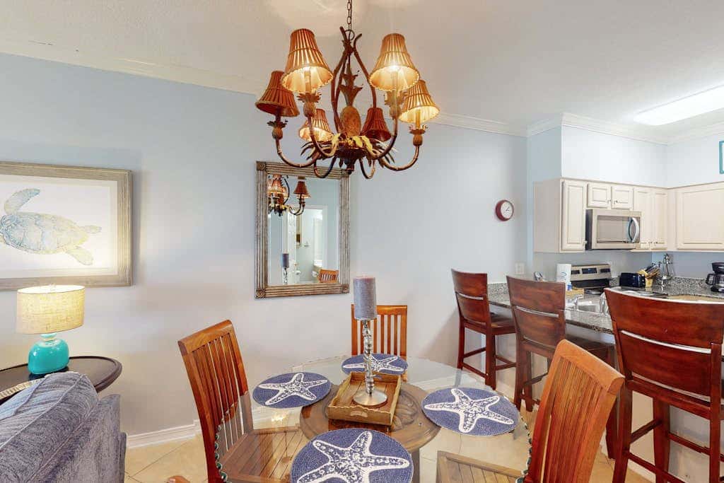 Beach-front condo with pool, hot tub, sauna, washer,dryer & grill