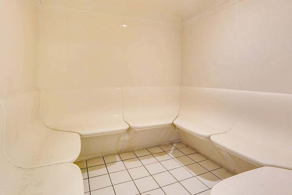 Beach-front condo with pool, hot tub, sauna, washer,dryer & grill