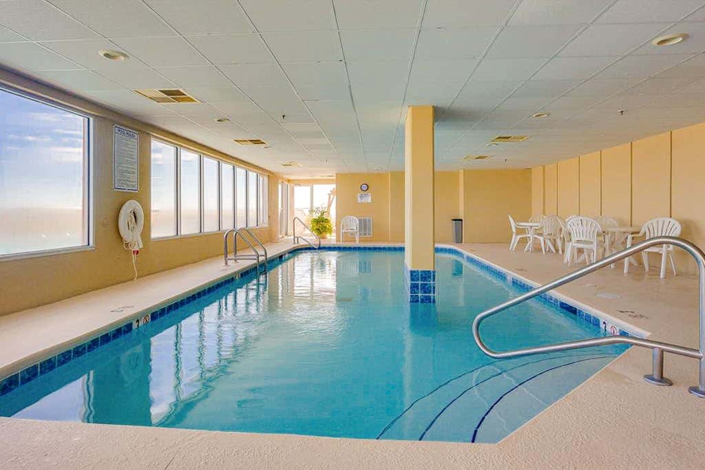 Beach-front condo with pool, hot tub, sauna, washer,dryer & grill