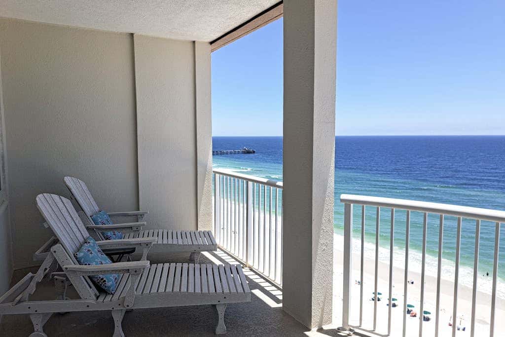 Beach-front condo with pool, hot tub, sauna, washer,dryer & grill
