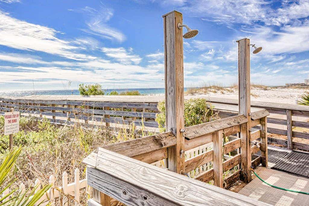 Beach-front condo with pool, hot tub, sauna, washer,dryer & grill