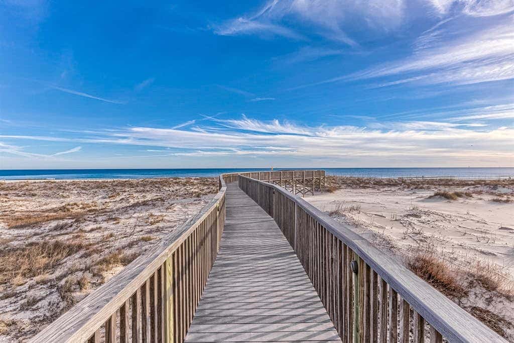 Coastal condo with beach access, pool, and hot tub