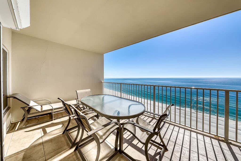 Beachfront condo with private balcony & shared pools, gym & sauna