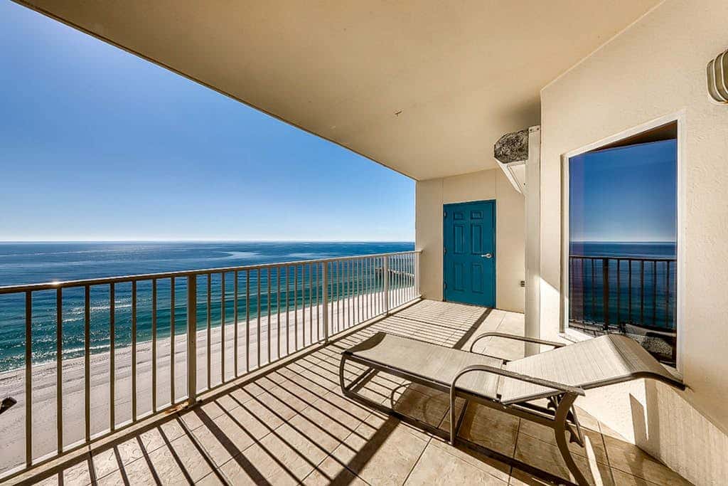 Beachfront condo with private balcony & shared pools, gym & sauna
