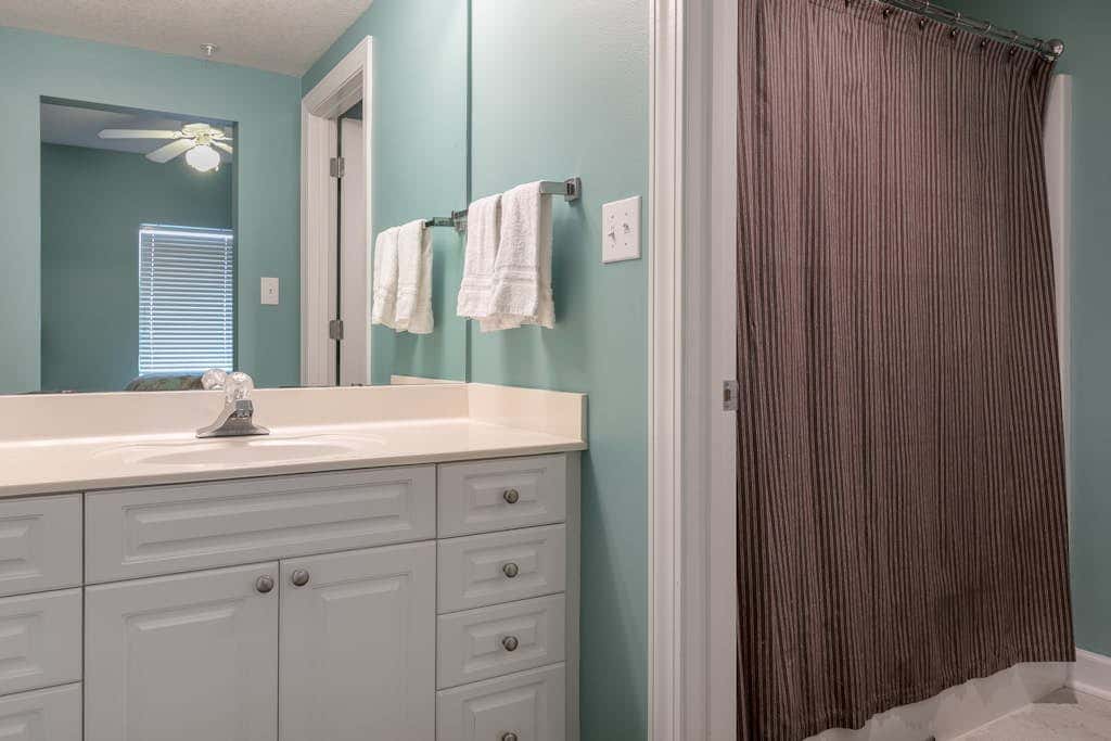 Beachfront condo with private balcony & shared pools, gym & sauna