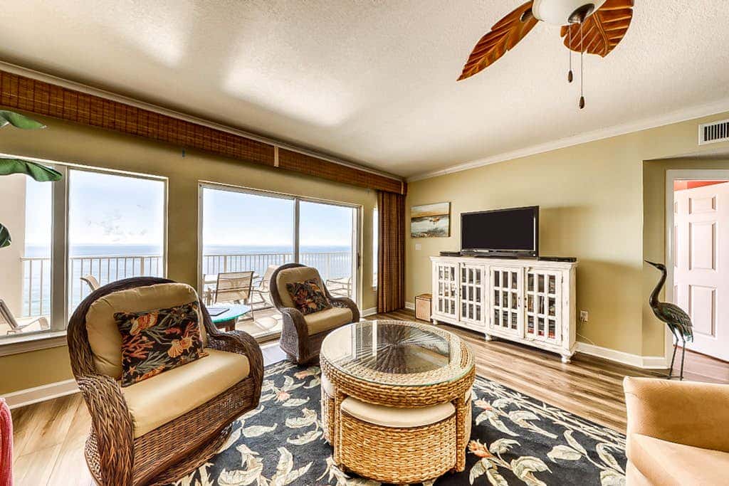 Beachfront condo with private balcony & shared pools, gym & sauna