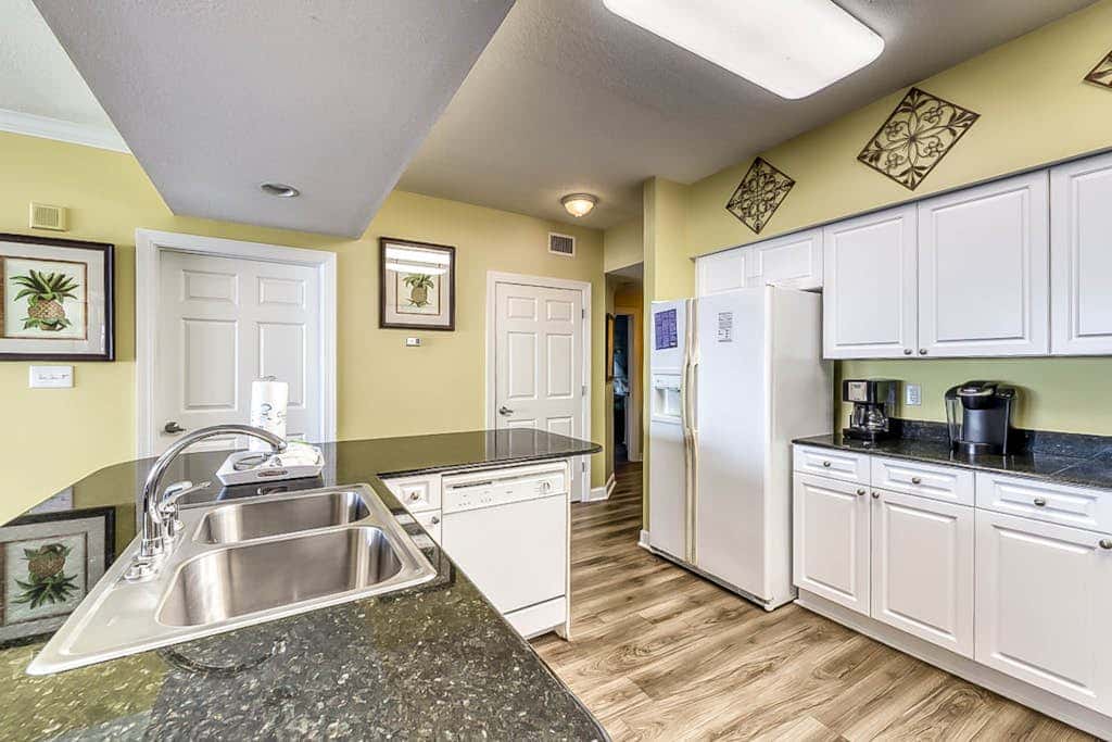 Beachfront condo with private balcony & shared pools, gym & sauna