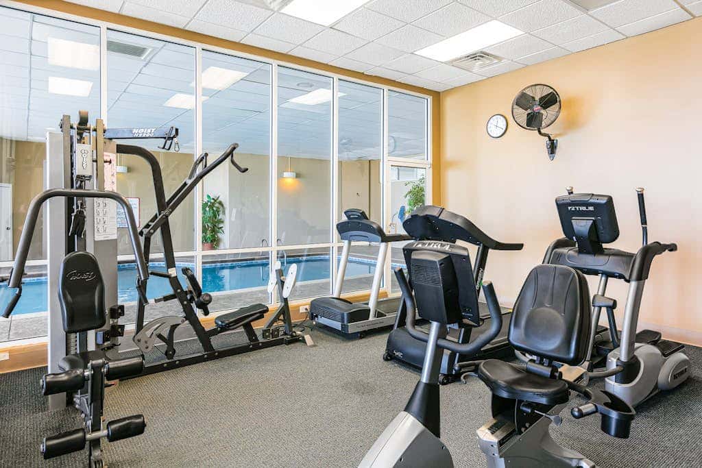 Beachfront condo with private balcony & shared pools, gym & sauna