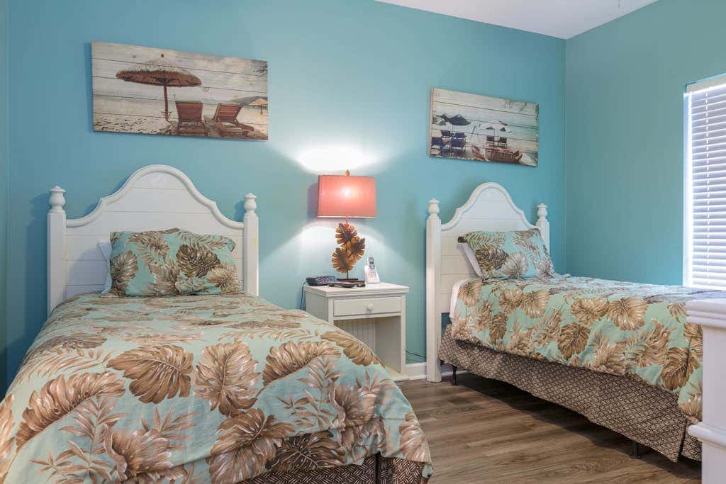 Beachfront condo with private balcony & shared pools, gym & sauna