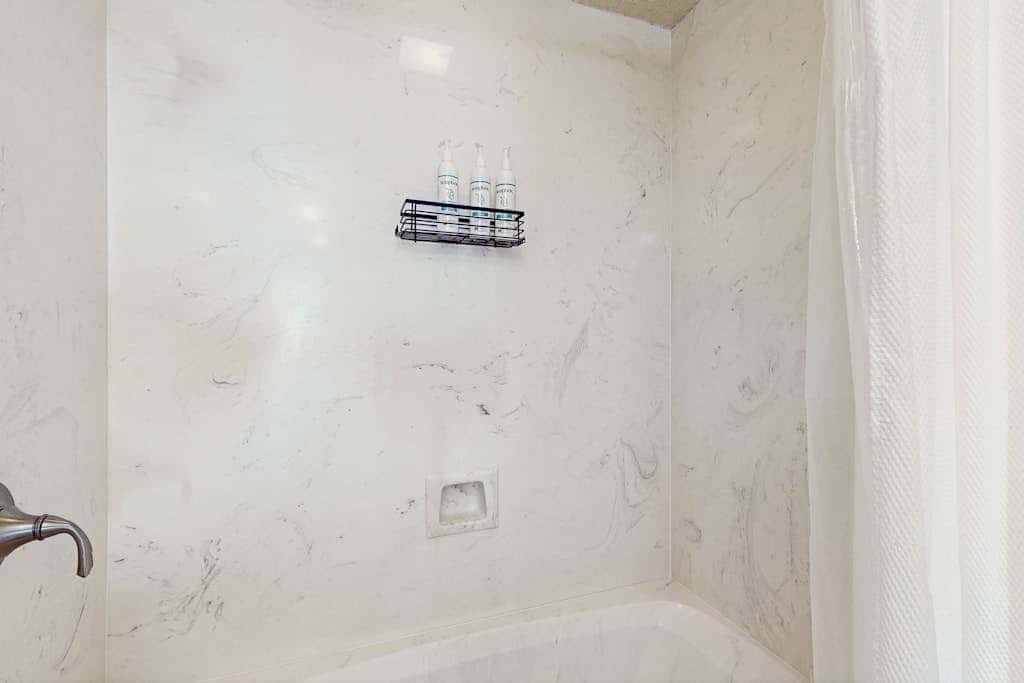 Gulf-front condo with furnished balcony, pools & hot tub