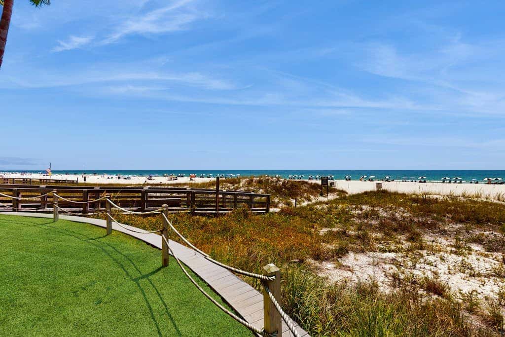 Gulf-front condo with furnished balcony, pools & hot tub