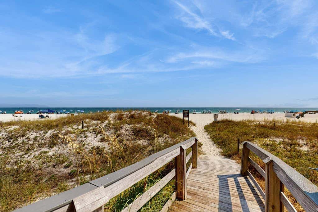Gulf-front condo with furnished balcony, pools & hot tub