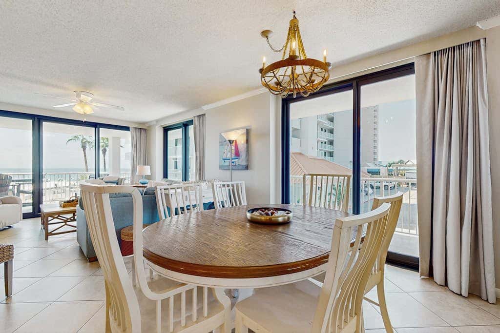 Gulf-front condo with furnished balcony, pools & hot tub