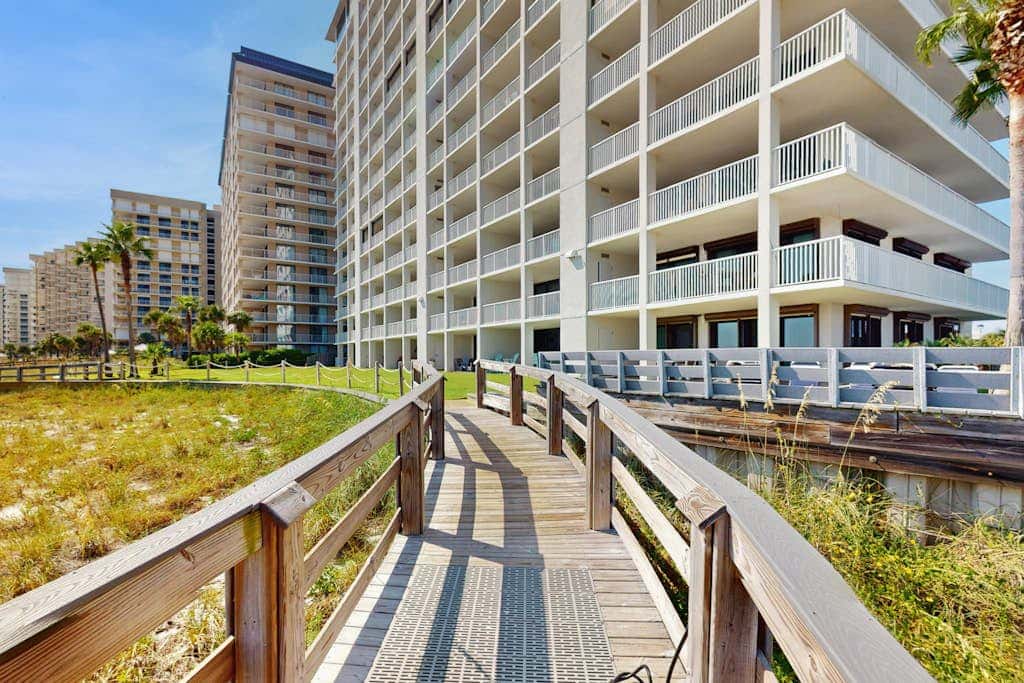 Gulf-front condo with furnished balcony, pools & hot tub