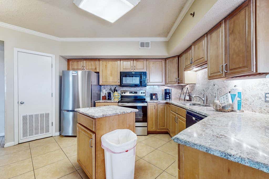 Gulf-front condo with furnished balcony, pools & hot tub