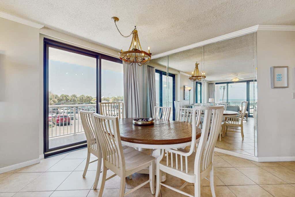 Gulf-front condo with furnished balcony, pools & hot tub