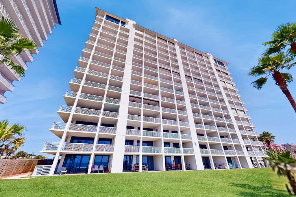 Gulf-front condo with furnished balcony, pools & hot tub