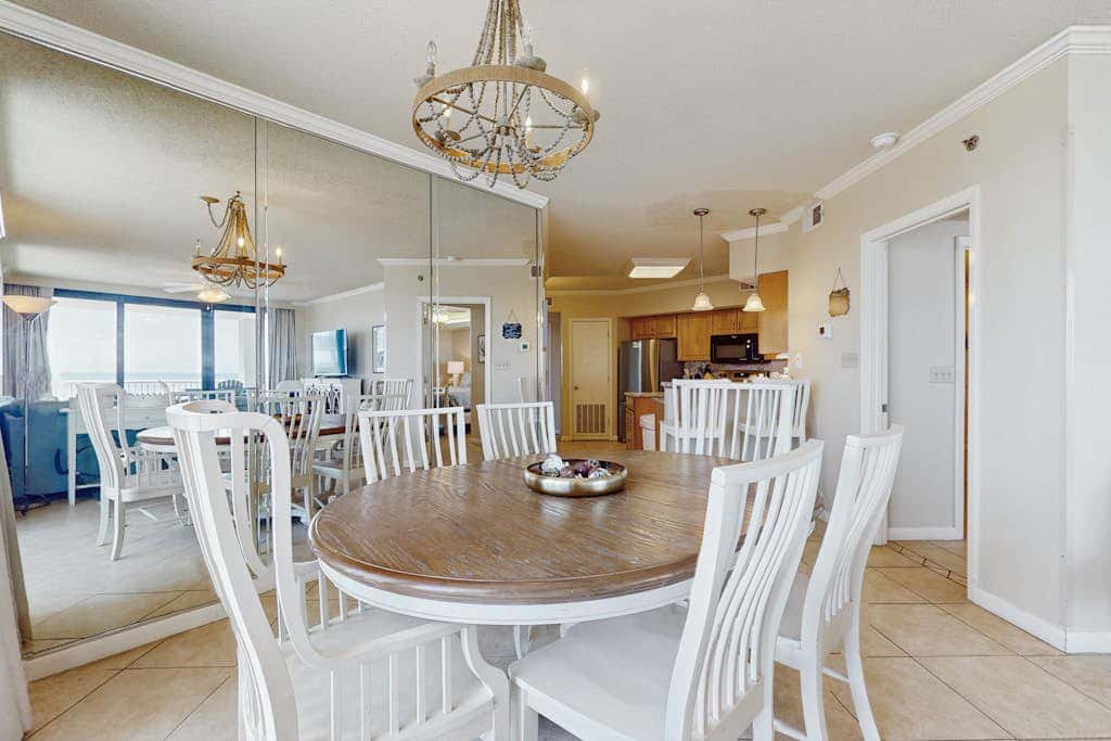 Gulf-front condo with furnished balcony, pools & hot tub