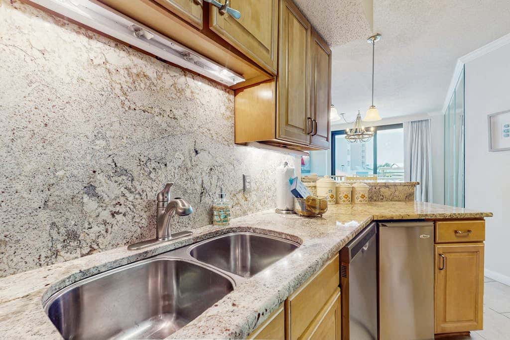 Gulf-front condo with furnished balcony, pools & hot tub