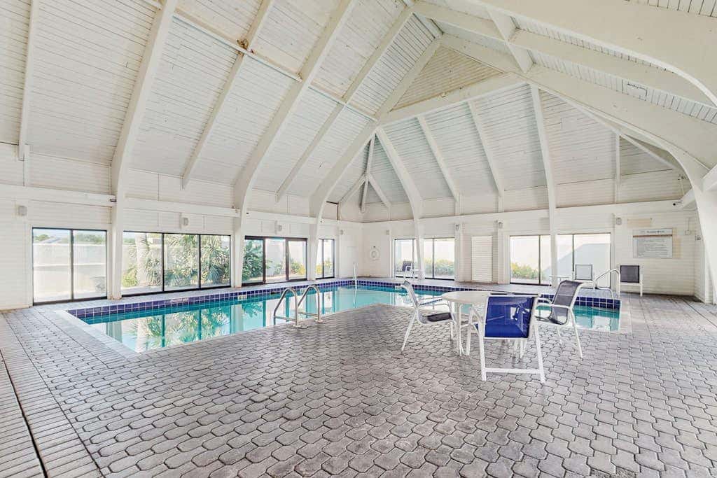 Contemporary Gulf front condo with shared pools, hot tub, fitness center, beach