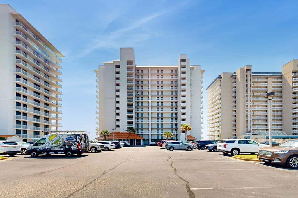 Contemporary Gulf front condo with shared pools, hot tub, fitness center, beach
