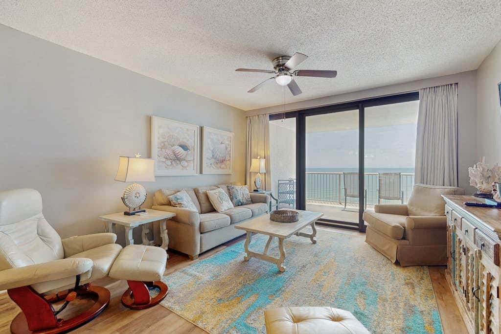 Contemporary Gulf front condo with shared pools, hot tub, fitness center, beach