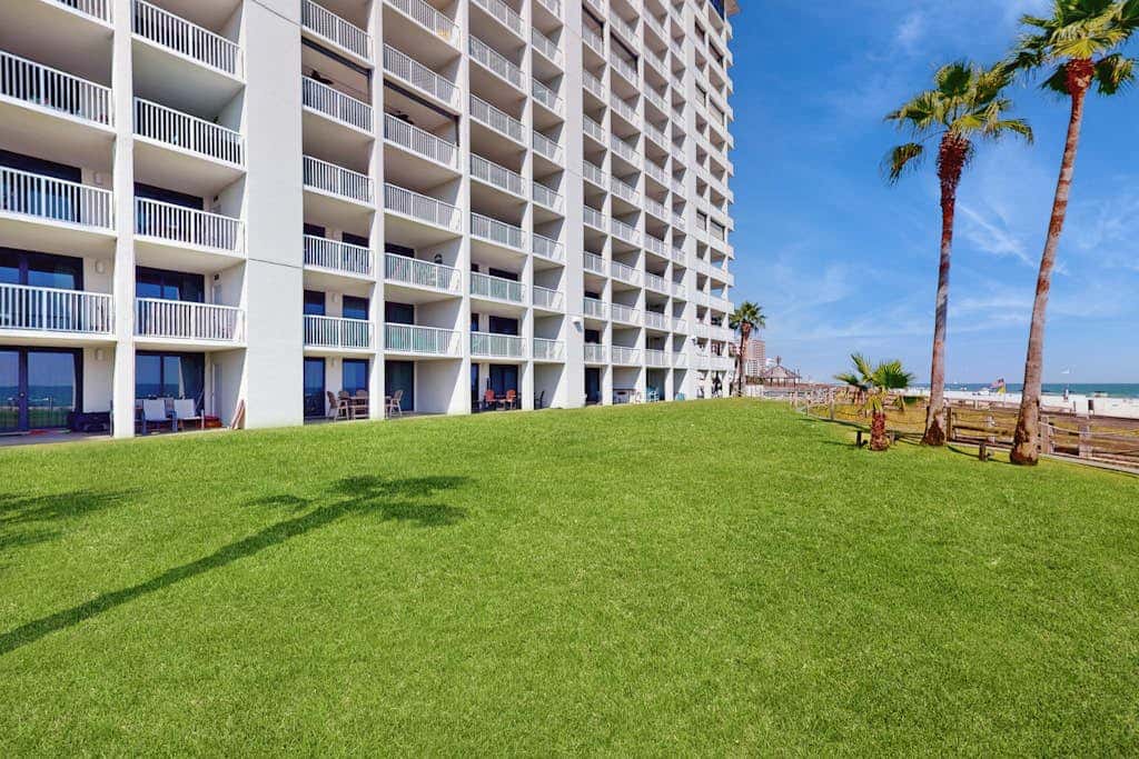 Contemporary Gulf front condo with shared pools, hot tub, fitness center, beach