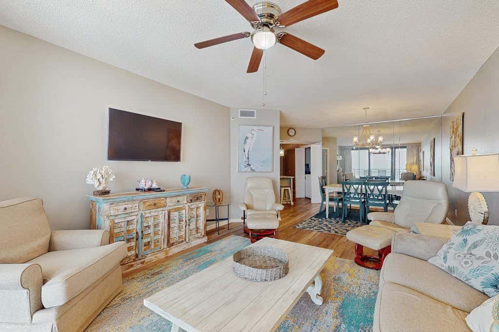 Contemporary Gulf front condo with shared pools, hot tub, fitness center, beach