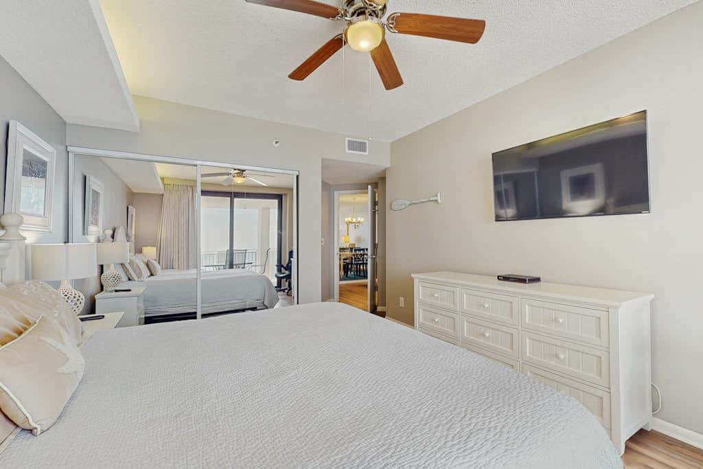 Contemporary Gulf front condo with shared pools, hot tub, fitness center, beach