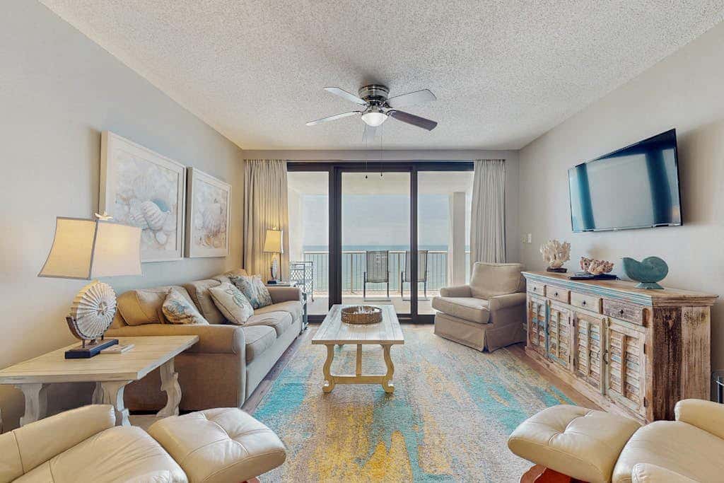 Contemporary Gulf front condo with shared pools, hot tub, fitness center, beach