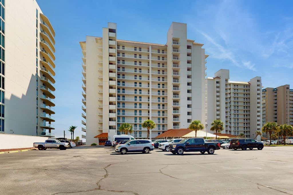Contemporary Gulf front condo with shared pools, hot tub, fitness center, beach