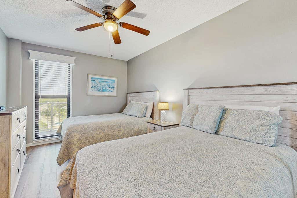 Contemporary Gulf front condo with shared pools, hot tub, fitness center, beach