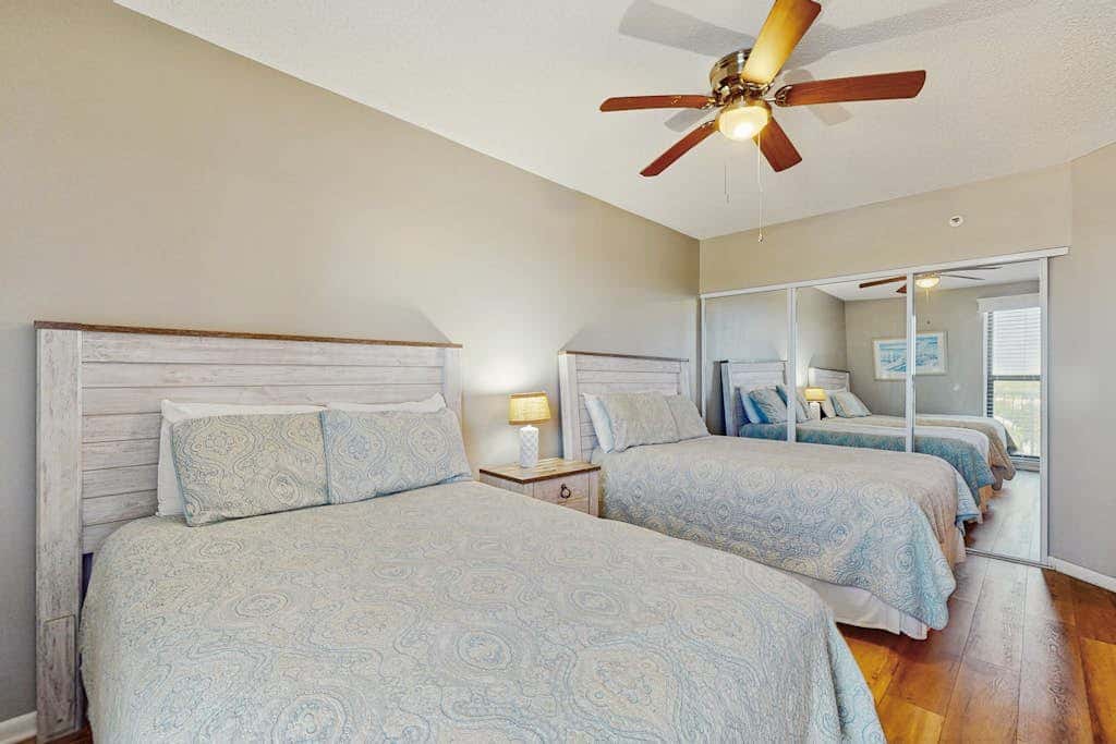 Contemporary Gulf front condo with shared pools, hot tub, fitness center, beach