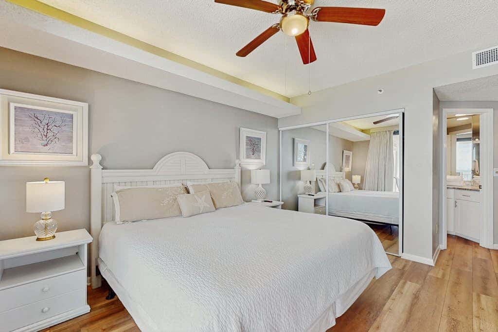 Contemporary Gulf front condo with shared pools, hot tub, fitness center, beach