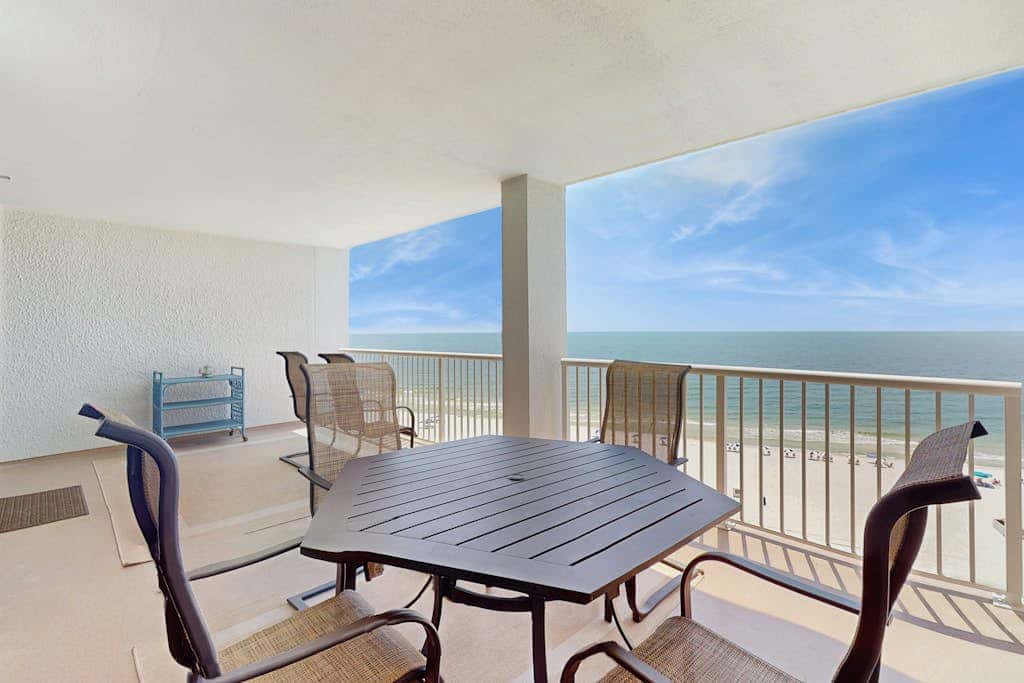 Contemporary Gulf front condo with shared pools, hot tub, fitness center, beach