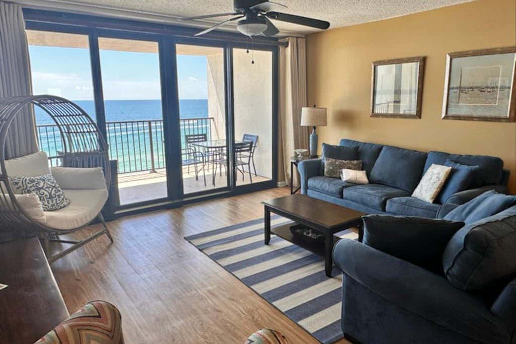 Beachfront condo with pool, private balcony, & washer and dryer!