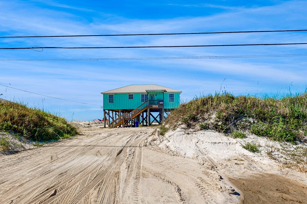 Dog-friendly beachfront home with spacious deck, amazing views of the Gulf