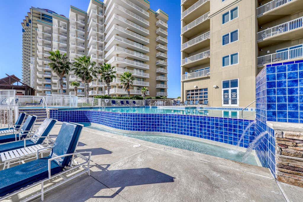 Stunning corner condo with, shared pools, hot tub, gym, beach access & balcony