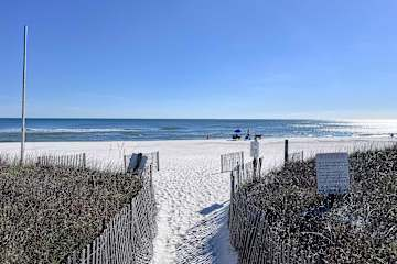 Gulf front condo with onsite snack bar, three shared pools, and internet
