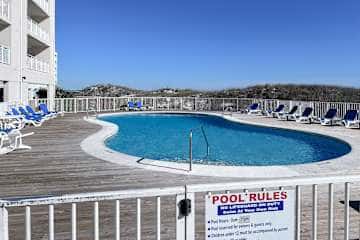 Gulf front condo with onsite snack bar, three shared pools, and internet