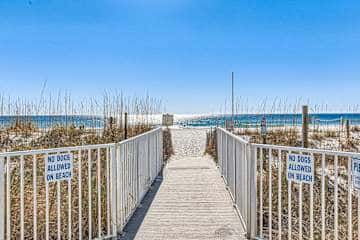 Gulf front condo with onsite snack bar, three shared pools, and internet