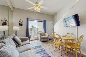 Gulf front condo with onsite snack bar, three shared pools, and internet