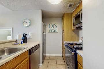 Gulf front condo with onsite snack bar, three shared pools, and internet