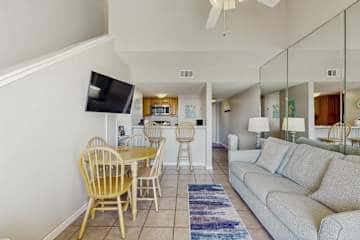 Gulf front condo with onsite snack bar, three shared pools, and internet