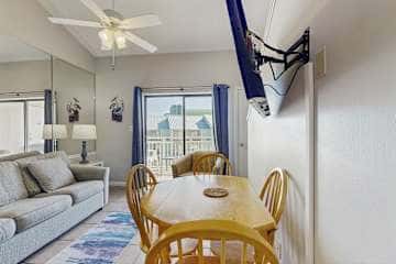 Gulf front condo with onsite snack bar, three shared pools, and internet