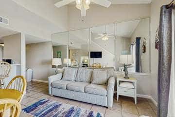 Gulf front condo with onsite snack bar, three shared pools, and internet