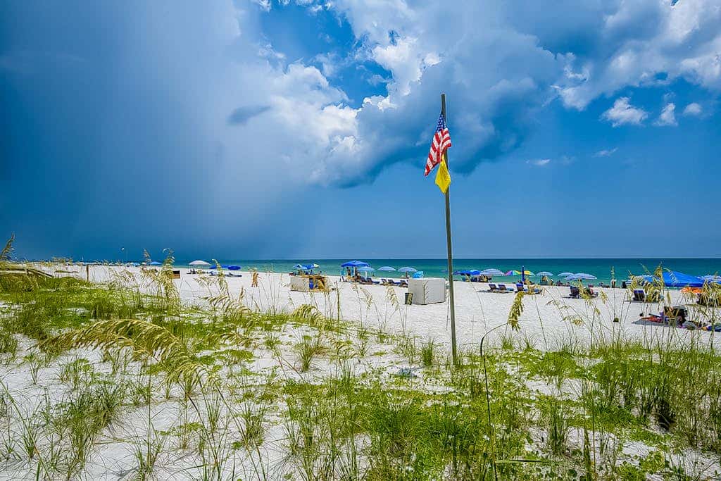 Dreamy beach condo with water views, balcony, pool & beach access