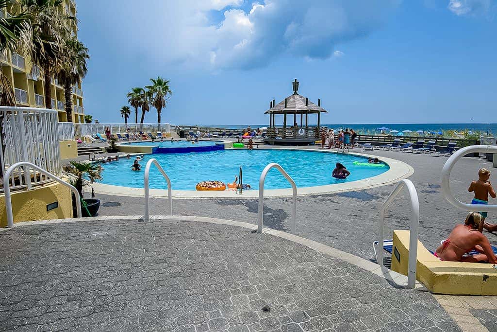 Dreamy beach condo with water views, balcony, pool & beach access